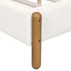 Lussuoso giroletto imbottito con robuste gambe in legno