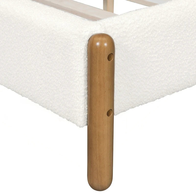 Lussuoso giroletto imbottito con robuste gambe in legno
