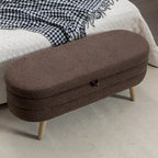Panca contenitore imbottita con gambe in legno